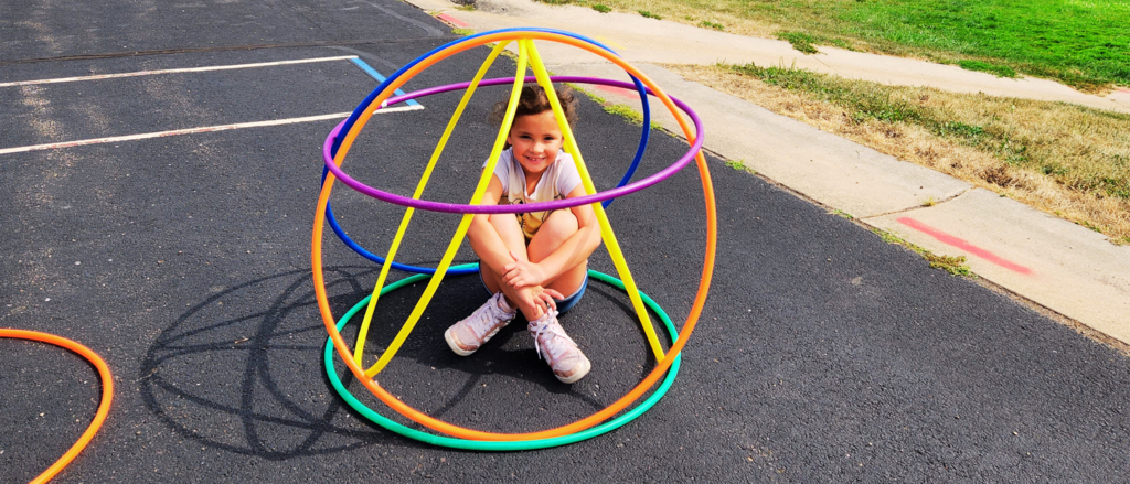 Student with hoola hoops